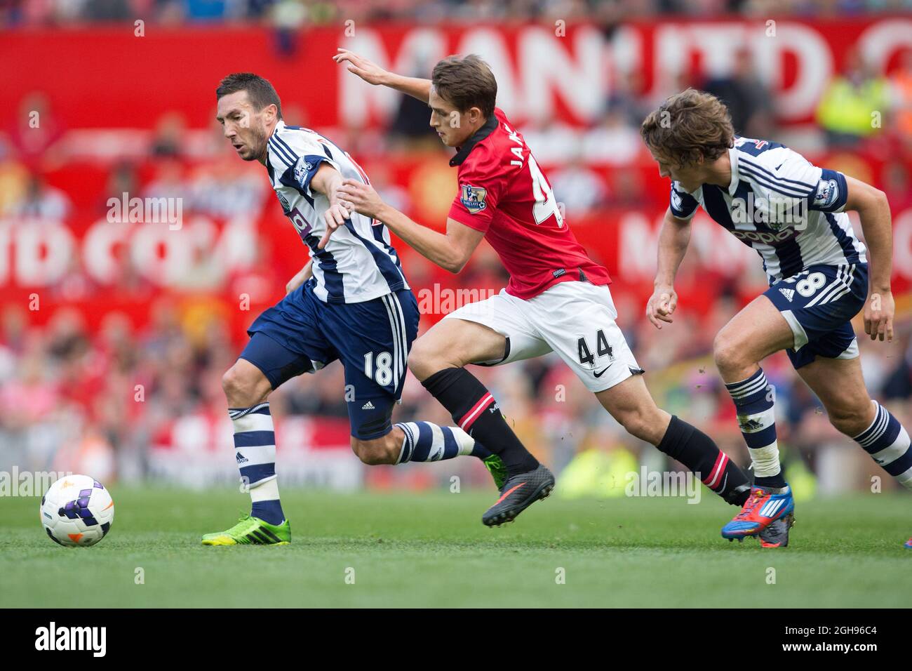 West Brom's Morgan Amalfitano battles Adnan Januzaj of Manchester United during the Barclays Premier League match between Manchester United and West Bromwich Albion at the Old Trafford in Manchester, United Kingdom on September 28, 2013. Stock Photo