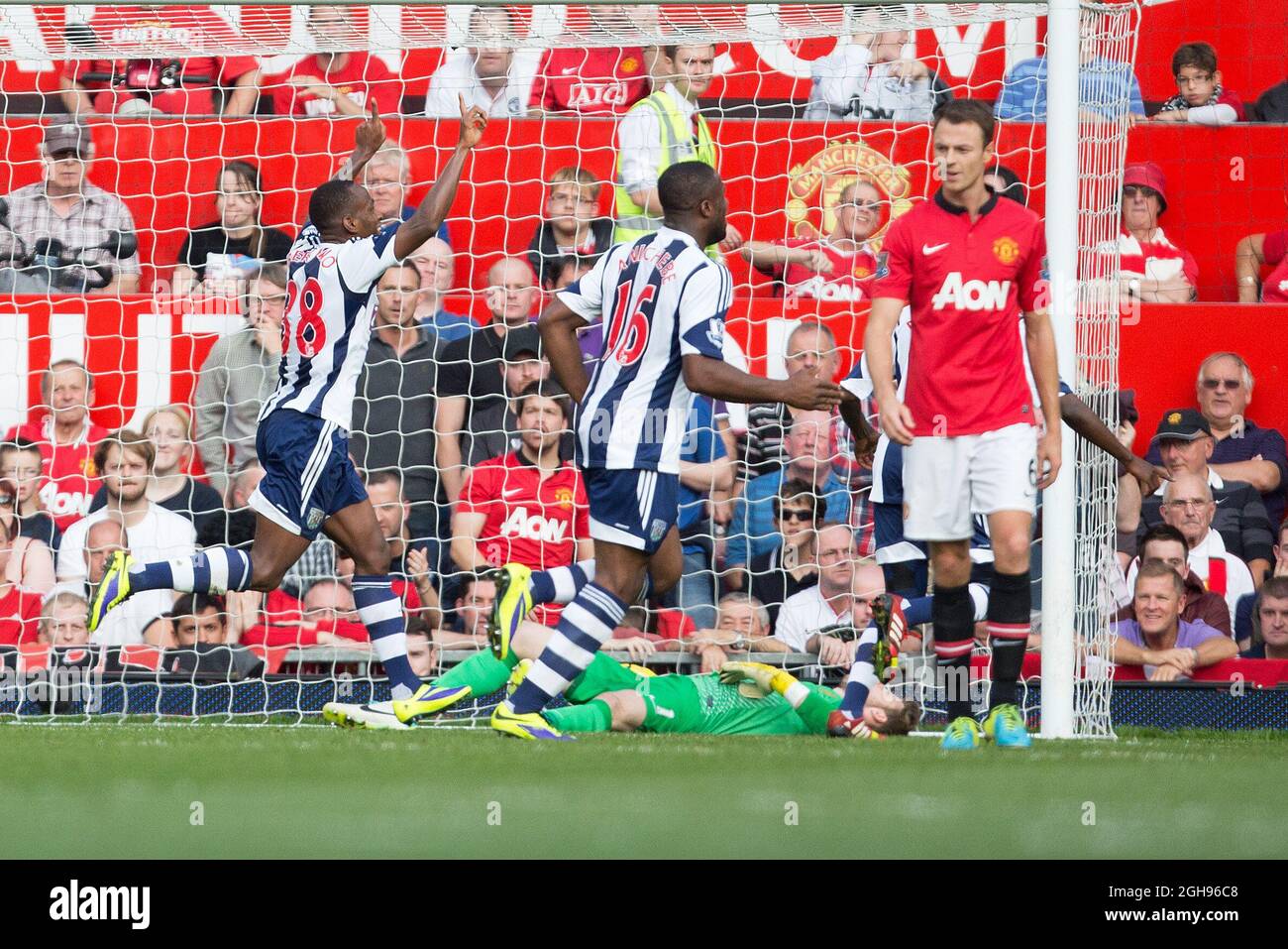 West Brom's Morgan Amalfitano celebrates his winning goal during the Barclays Premier League match between Manchester United and West Bromwich Albion at the Old Trafford in Manchester, United Kingdom on September 28, 2013. Stock Photo