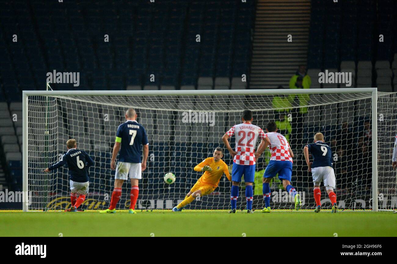 Barry Bannan of Scotland takes a penalty which was saved by Stipe Pletikosa of Croatia during their FIFA World Cup 2014 qualifier soccer match between Scotland and Croatia at the Hampden Park Stadium in Glasgow, United Kingdom , Oct. 15, 2013. Picture Simon Bellis Stock Photo