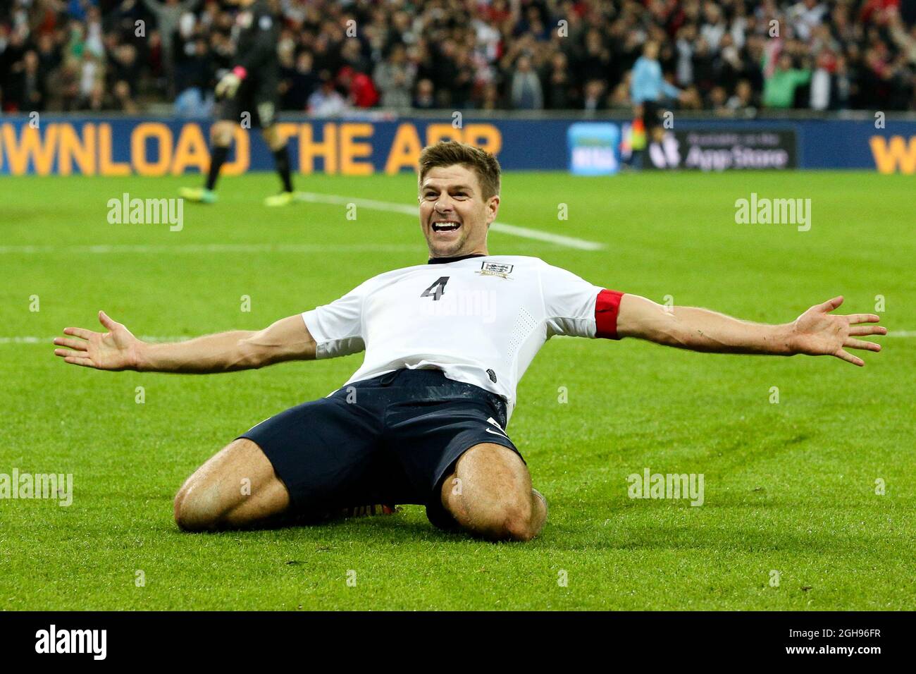 England's Steven Gerrard (captain) celebrates scoring England's 2nd goal - England v Poland during their FIFA World Cup 2014 qualifier soccer match between England and Poland at the Wembley in London, England, Oct. 15, 2013. Pic Charlie Forgham Stock Photo