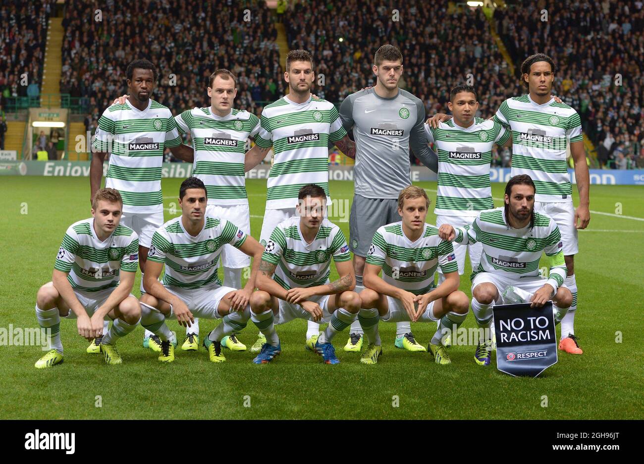 Celtic team group back row from left Efe Ambrose, Anthony Stokes, Charlie Mulgrew, Fraser Forster, Emilio Izaguirre and Virgil van Dijk of Celtic .Front row from left James Forrest, Biram Kayal, Mikael Lustig, Teemu Pukki and Georgios Samaras of Celtic during UEFA Champions League Group H match between Celtic and Ajax at Celtic Park Stadium on Oct. 22, 2013, Glasgow, Scotland, Stock Photo