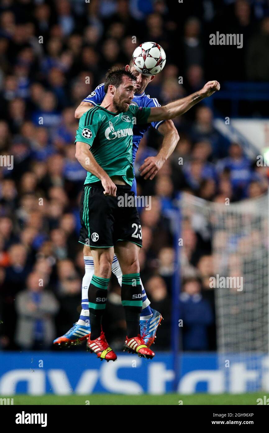 Gary Cahill of Chelsea and FC Schalke's Christian Fuchs during the Champions League group E soccer match between Chelsea and FC Schalke 04 at Stamford Bridge Stadium in London on November 6, 2013. Stock Photo