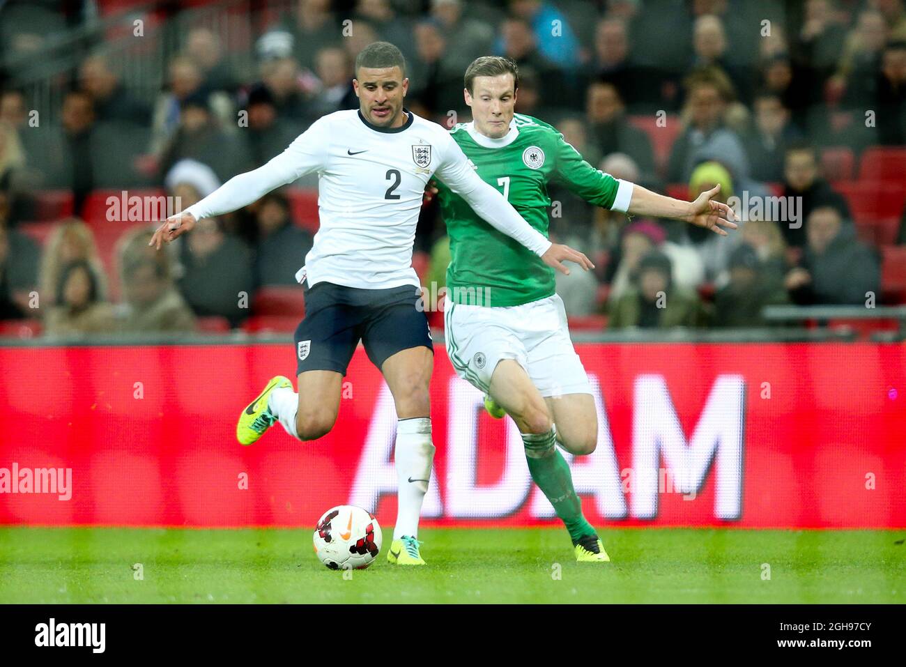 England's Kyle Walker and Germany's Marcell Jansen during the International Friendly match between England and Germany held at the Wembley Stadium in London on Nov. 19, 2013. Stock Photo