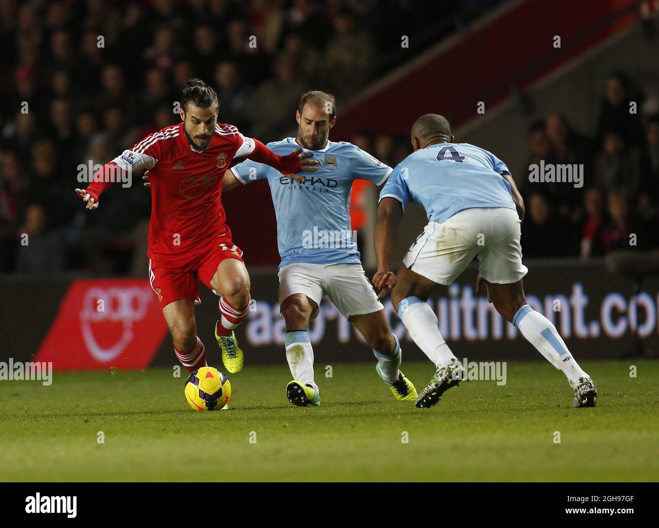 Southampton's Dani Osvaldo tussles with Manchester City's Pablo Zabaleta during the Barclays Premier League match between Southampton and Manchester City at St Mary's Stadium, Southampton on December 7, 2013. Pic: David Klein Stock Photo
