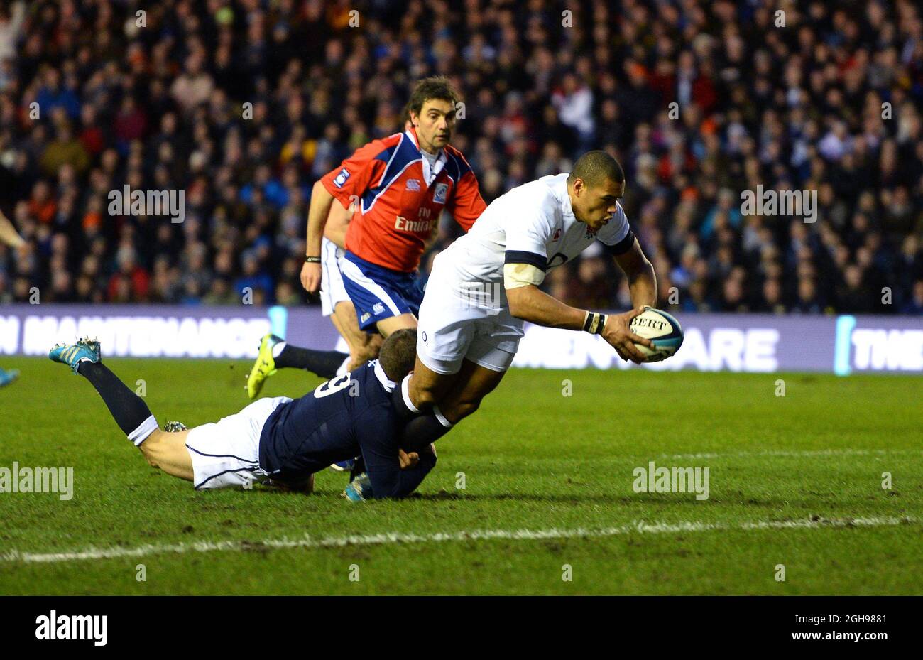 Luther Burrell of England scores the first try during the RBS 6Nations match between Scotland and England at Murrayfield Stadium, Edinburgh on February 8, 2014. Stock Photo
