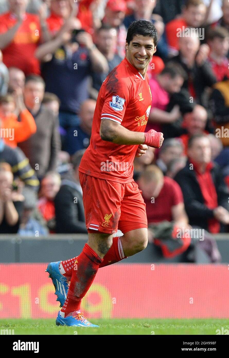 Luis Suarez of Liverpool celebrates scoring the second goal during the Barclays Premier League match between Liverpool and Tottenham at the Anfield Stadium in Liverpool, England on March 30, 2014. Stock Photo