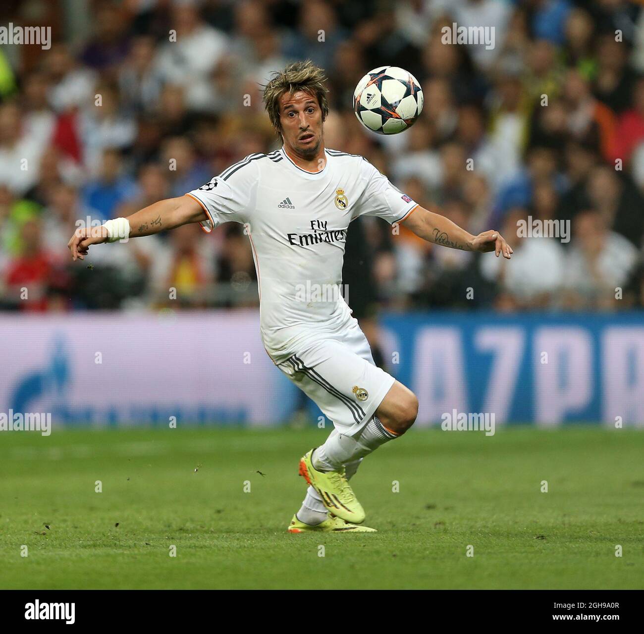 Real Madrid's Fabio Coentrao in action during their UEFA Champion League semi-final first leg soccer match between Real Madrid and Bayern Munich at Santiago Bernabeu in Madrid, Spain on April 23, 2014. Pic David Klein Stock Photo