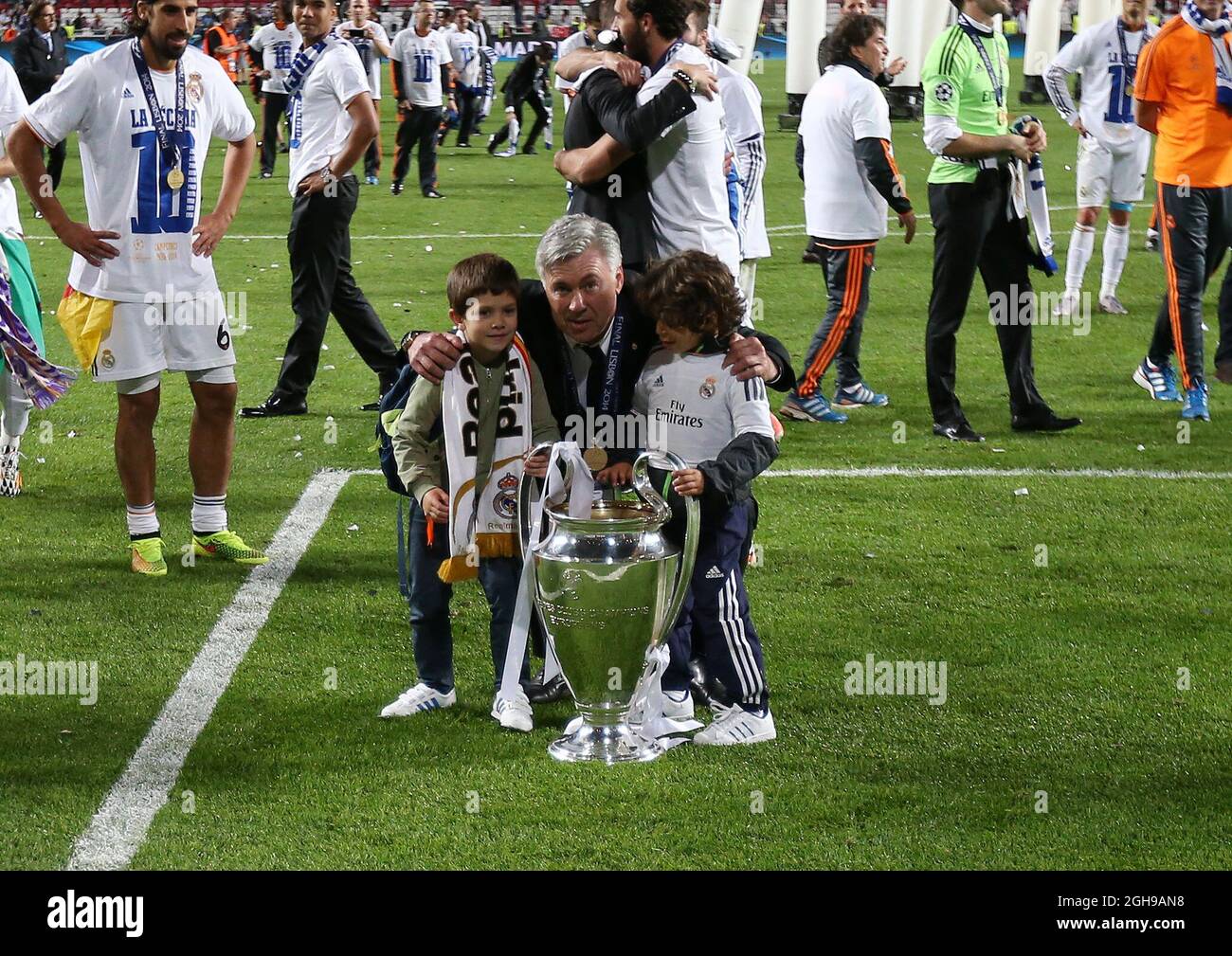 Real Madrid's Carlo Ancelotti Celebrates With The Trophy After The UEFA ...