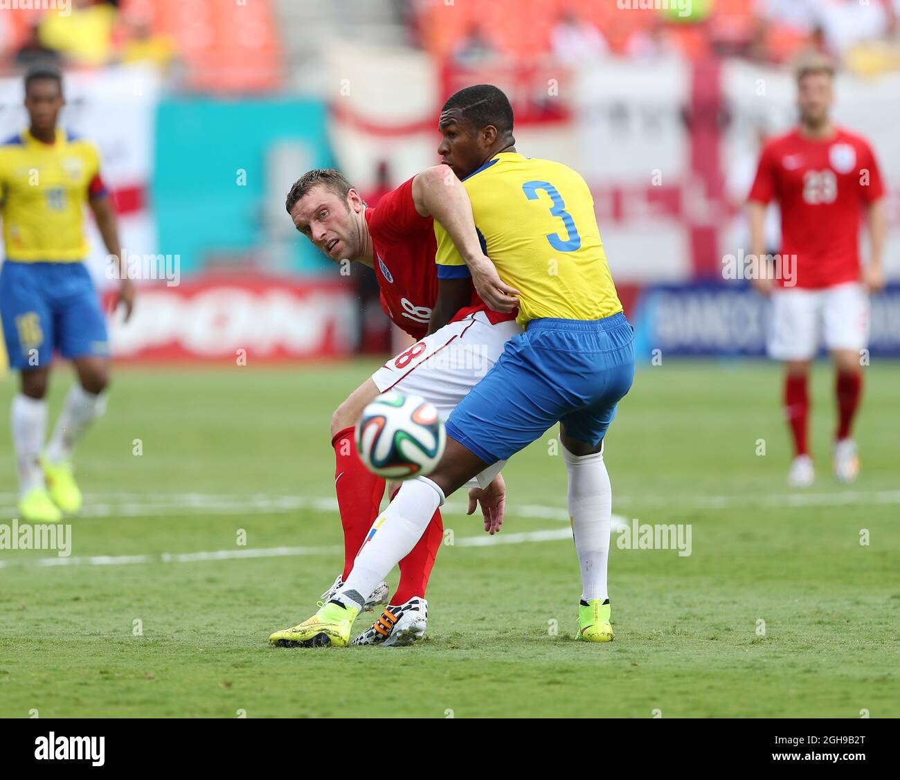 England's Rickie Lambert tussles with Ecuador's Frickson Erazo during the International Friendly match between England and Ecuador held at Sun Life Stadium in Miami, USA on June 4, 2014. Pic David Klein/Sportimage. Stock Photo