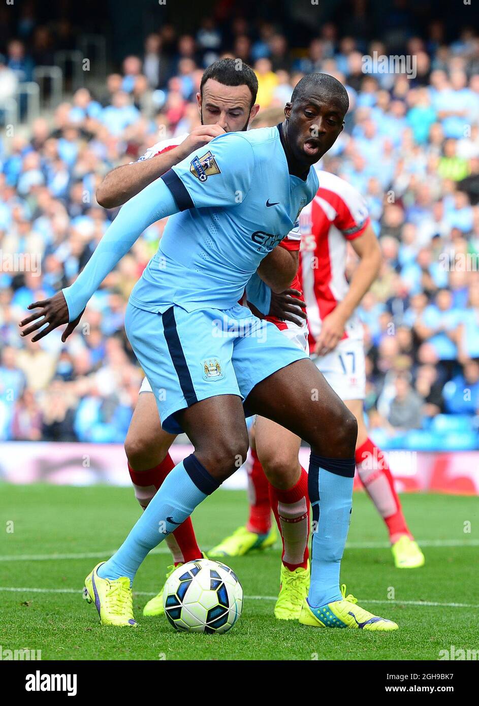 Yaya Toure of Manchester City in action during the Barclays Premier League  match between Manchester City and Stoke City in Etihad Stadium, Manchester  on August 30, 2014. Picture Simon Bellis/Sportimage Stock Photo -