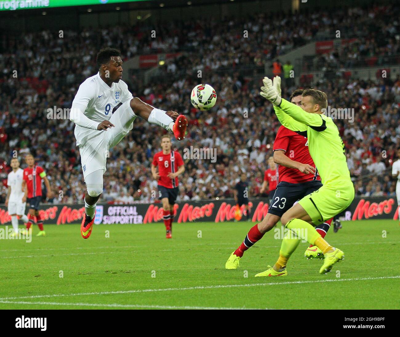England's Daniel Sturridge lobs the ball over the bar during the International Friendly match between England and Norway at Wembley Stadium in London, on September 3, 2014. Stock Photo