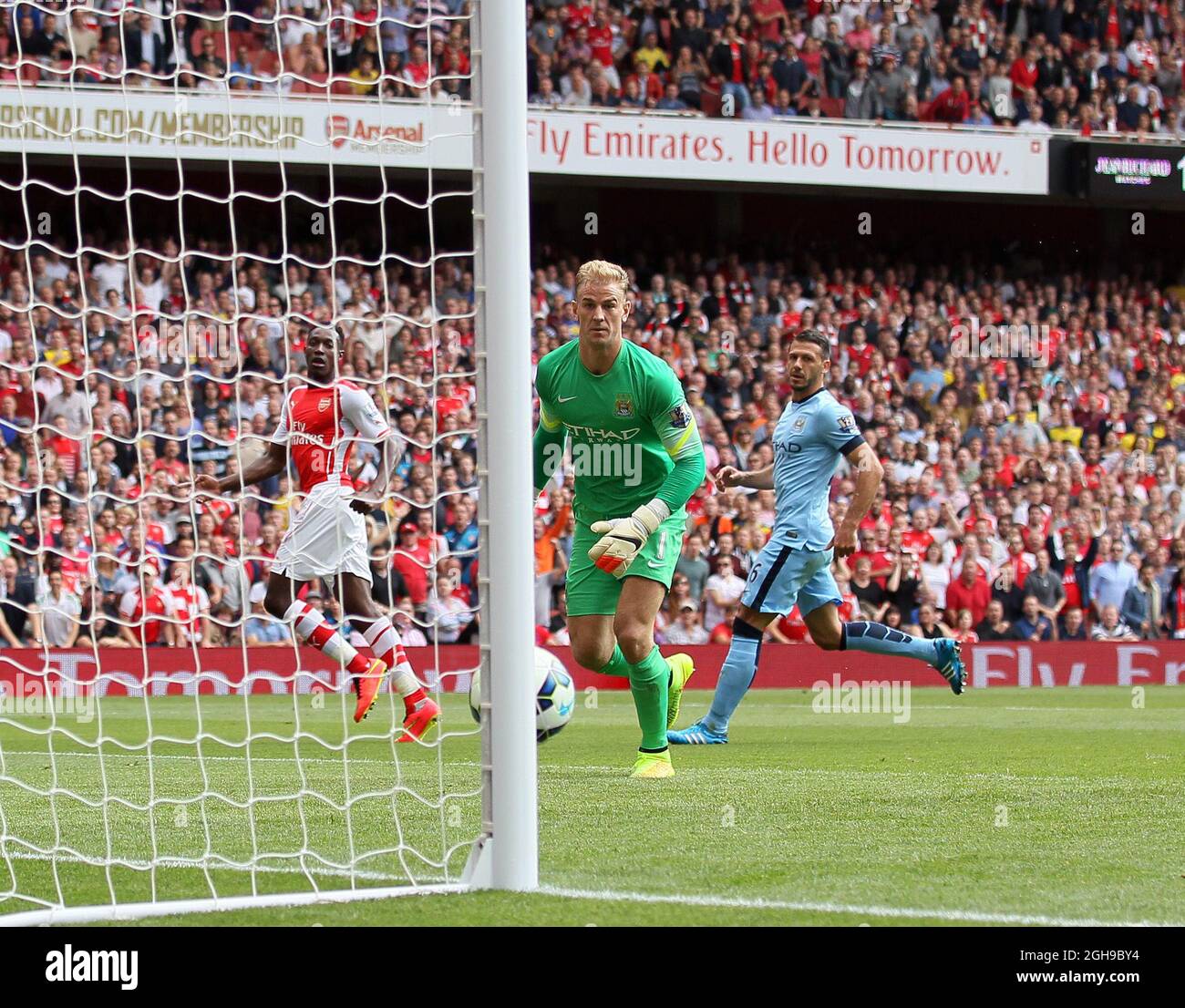 arsenals-danny-welbeck-watches-as-his-shot-hits-the-post-during-the-barclays-premier-league-the-match-between-arsenal-and-manchester-city-at-emirates-stadium-on-september-13-2014-2GH9BY4.jpg