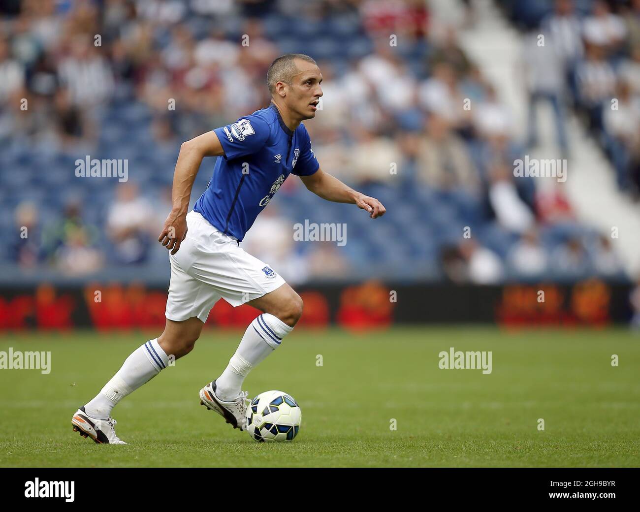 Leon Osman of Everton during their English Premier League soccer match at the Hawthorns in West Bromwich, central England, September 13, 2014. Stock Photo