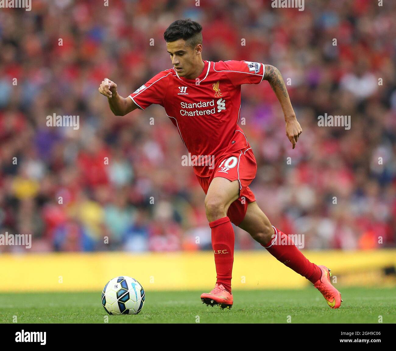 Philippe Coutinho of Liverpool in action during their English Premier League soccer match at Anfield in Liverpool, northern England September 13, 2014. Stock Photo