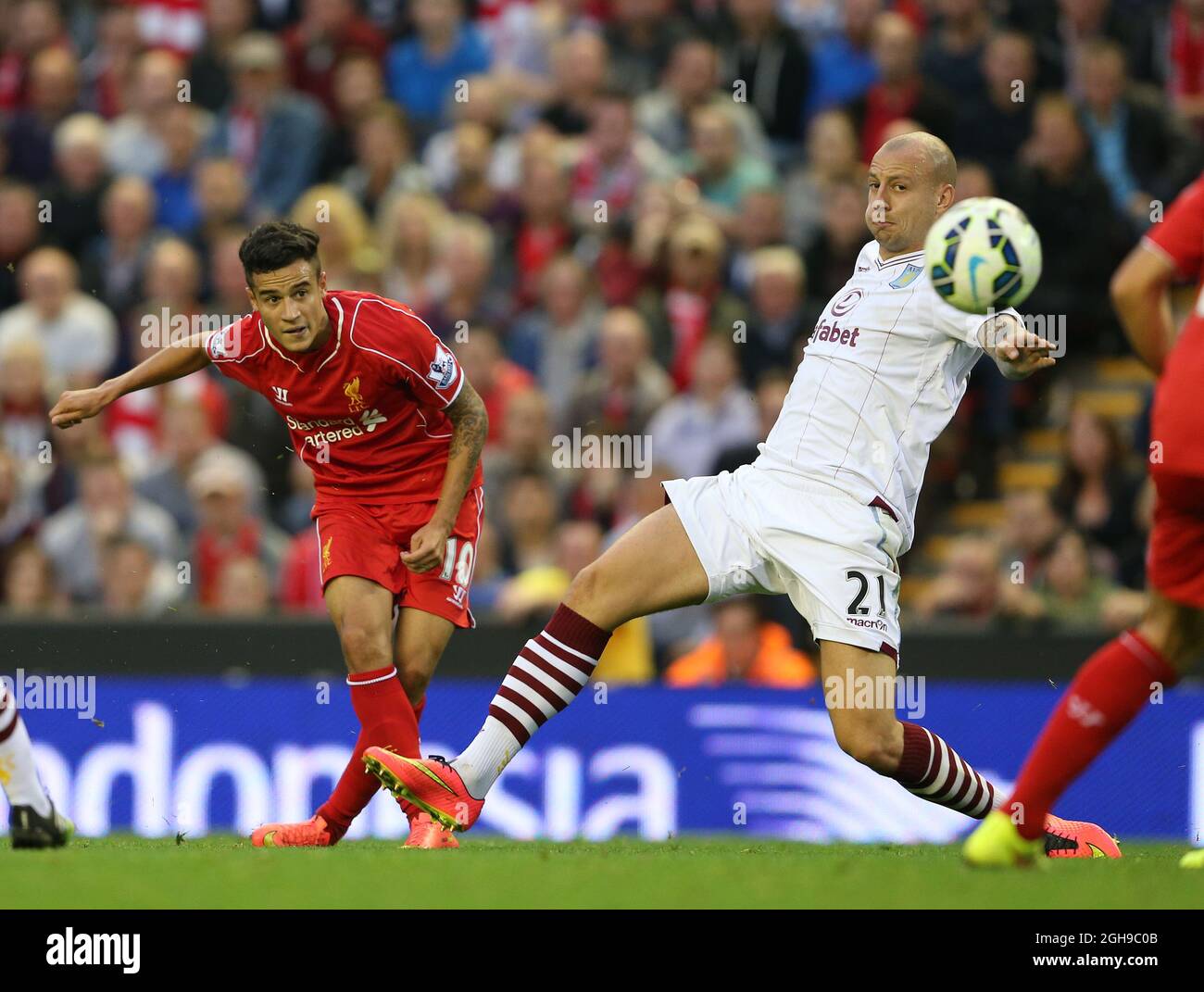 Philippe Coutinho of Liverpool fires in a shot during their English Premier League soccer match at Anfield in Liverpool, northern England September 13, 2014. Stock Photo