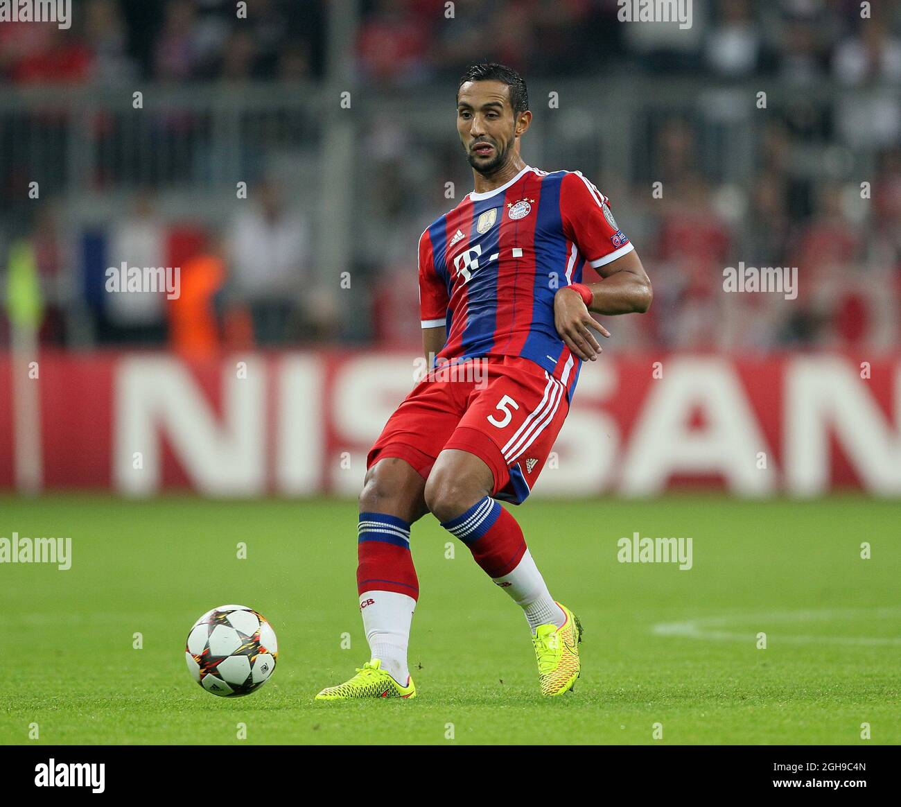 Bayern Munich's Mehdi Benatia in action during the Champions League Group E match between Bayern Munich and Manchester City held at Allianz Arena in Germany on Sept. 17, 2014 . Stock Photo