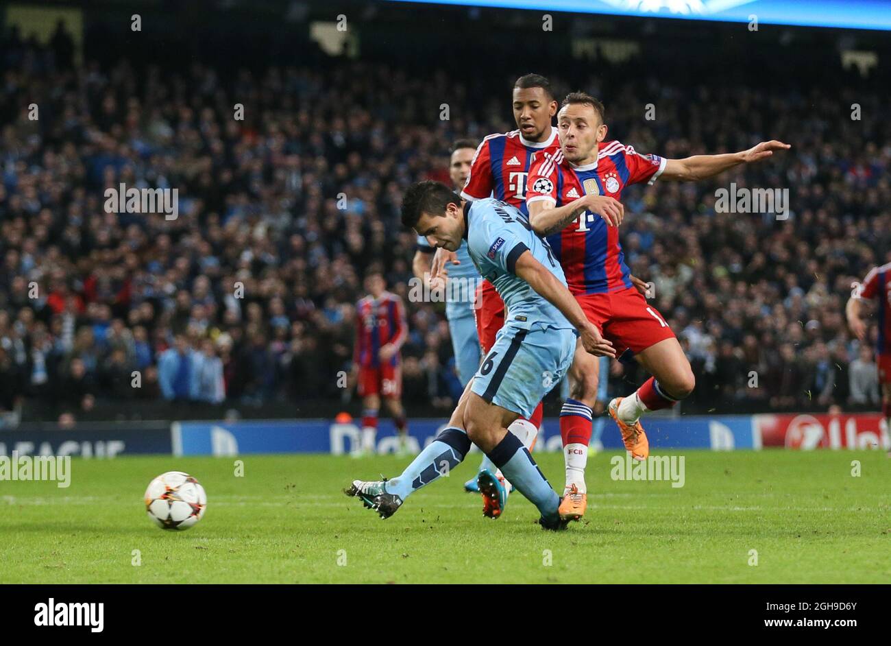 Sergio Aguero of Manchester City scores the third goal during the Champions League Group E match between Manchester City and Bayern Munich held at Etihad Stadium in England on Nov. 25, 2014. Simon Bellis Stock Photo