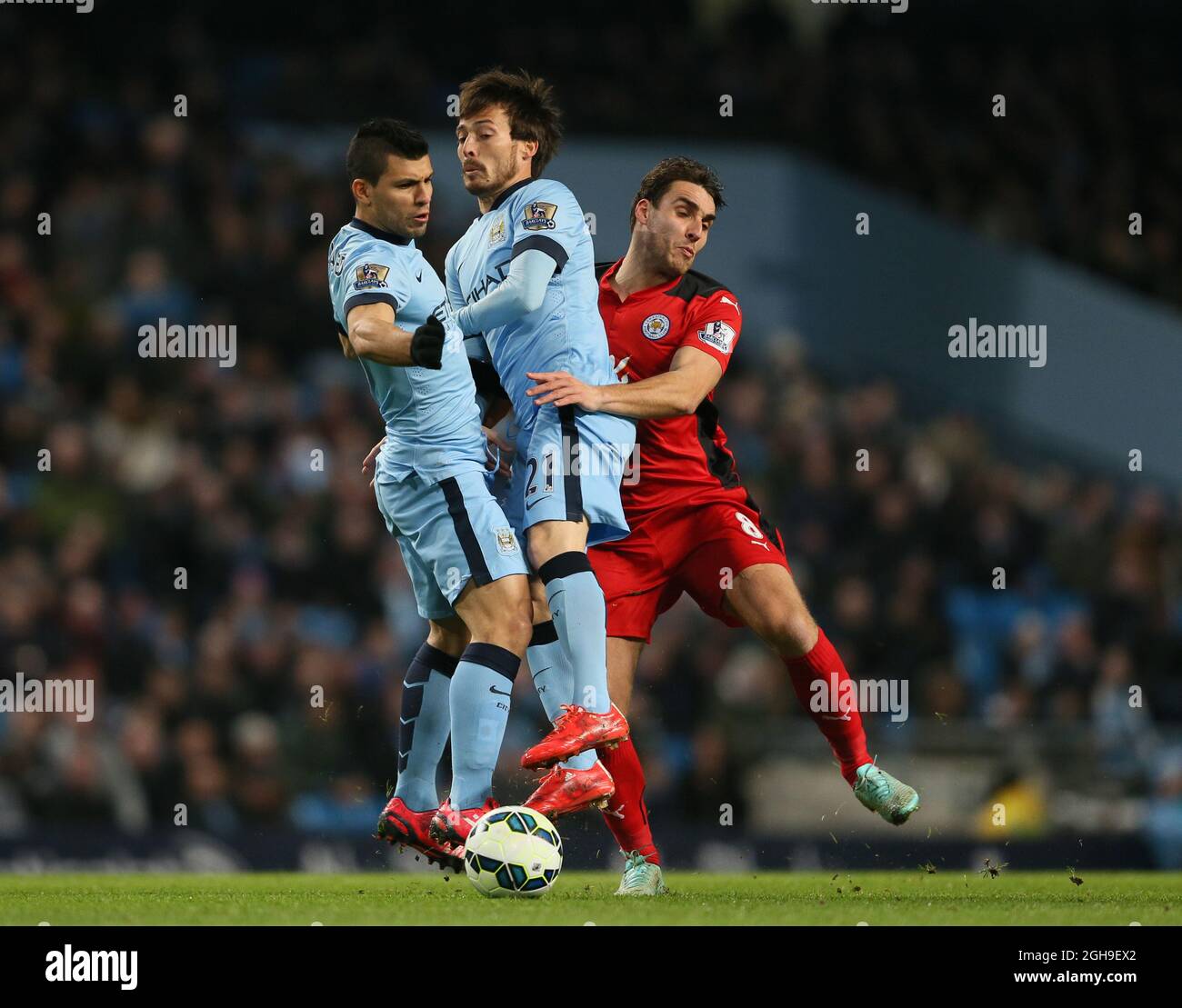 Sergio Aguero of Manchester City and David Silva of Manchester City get in each others way during the Barclays Premier League match between Manchester City and Leicester City at the Etihad Stadium, Manchester, England on 4th March 2015. Picture Simon Bellis. Stock Photo