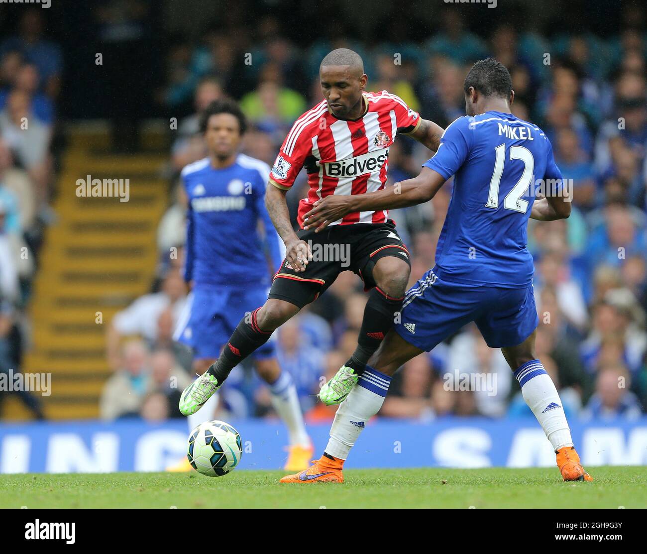 Chelsea's John Mikel Obi tussles with Sunderland's Jermain Defoe during the Barclays Premier League match between Chelsea and Sunderland at the Stamford Bridge, London on May 24, 2015. Picture: David Klein. Stock Photo