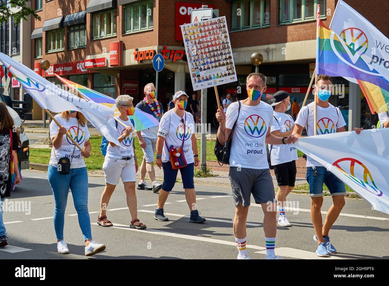 Braunschweig, Germany, August 14, 2021: Employees of the car manufacturer Volkswagen march at the CSD Christopher Street day demonstration. Stock Photo