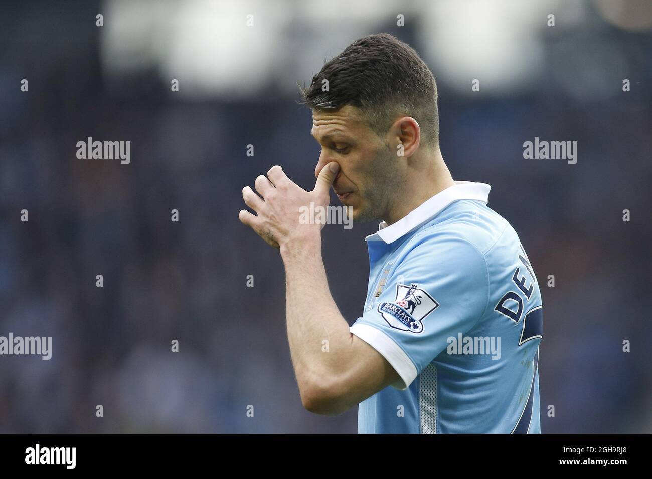 Martin Demichelis of Manchester City dejected during the Barclays Premier League match at the Etihad Stadium. Photo credit should read: Philip Oldham/Sportimage via PA Images Stock Photo