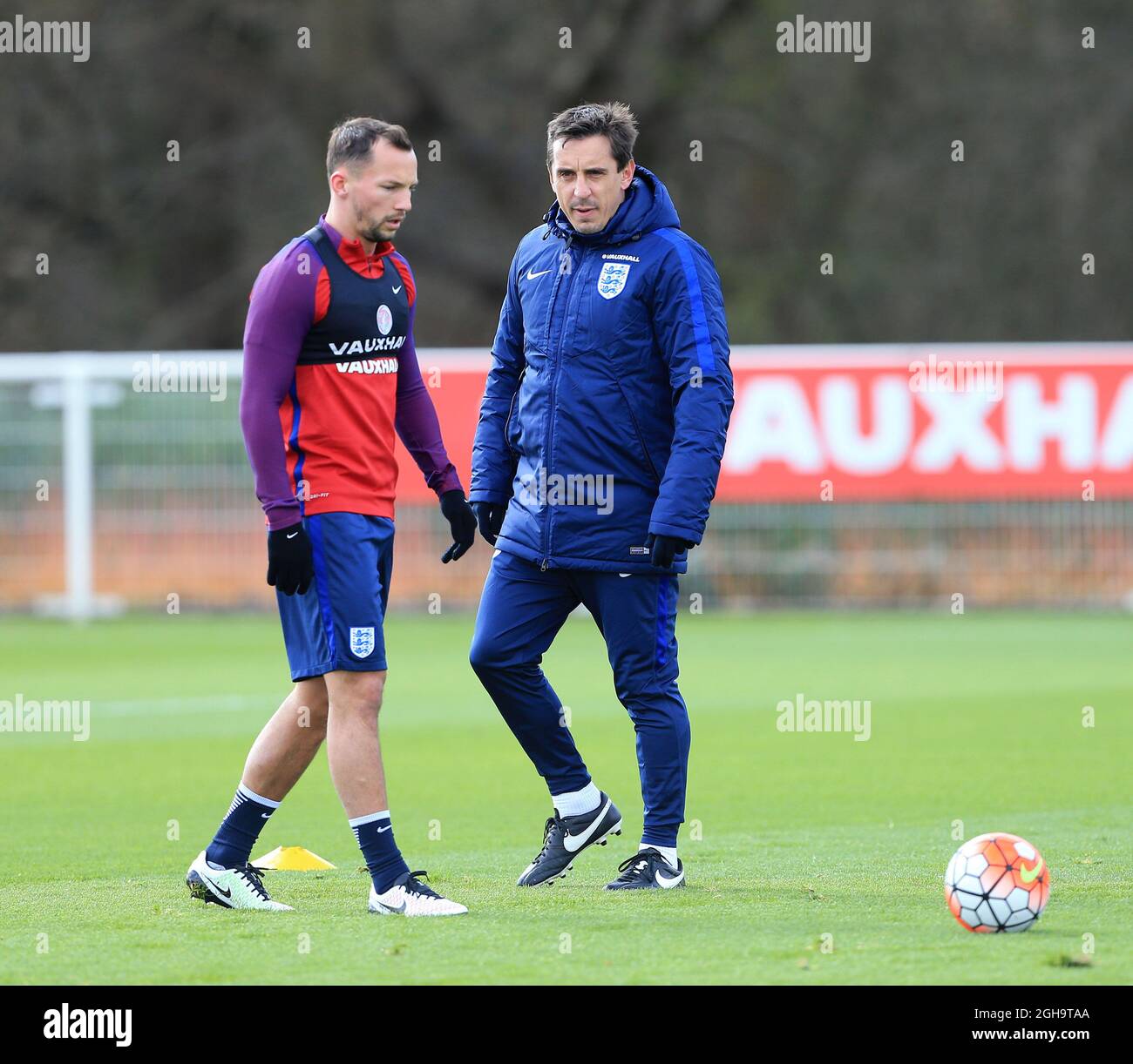England s Gary Neville watches Danny Drinkwater during training at