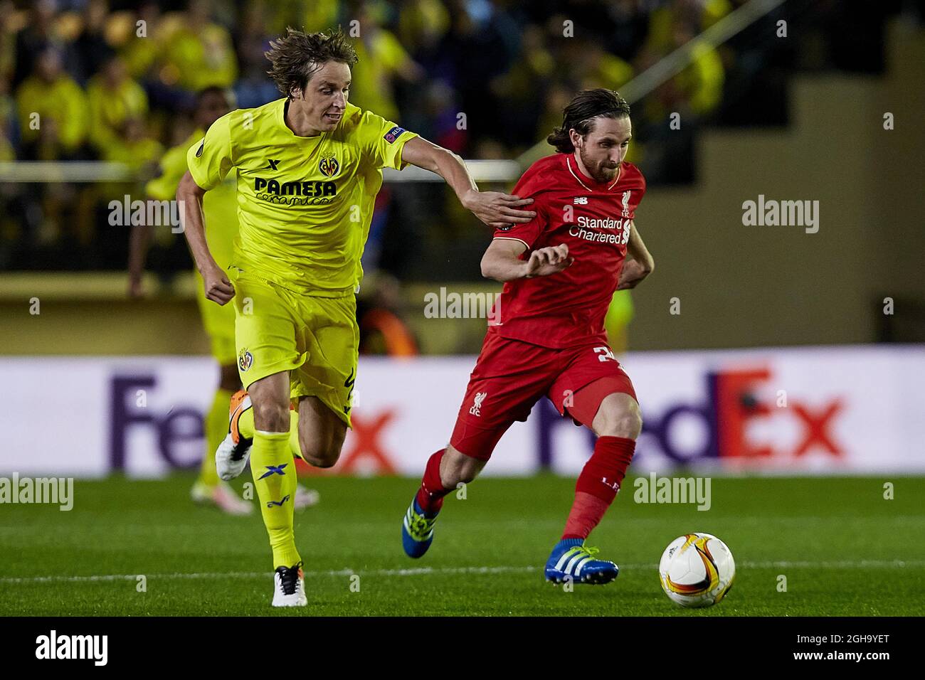 Joe Allen of Liverpool FC competes for the ball with Tomas Pina Spanish  midfielder of Villarreal CF during the UEFA Europa League Semi Final match  at El Madrigal stadium. Photo credit should