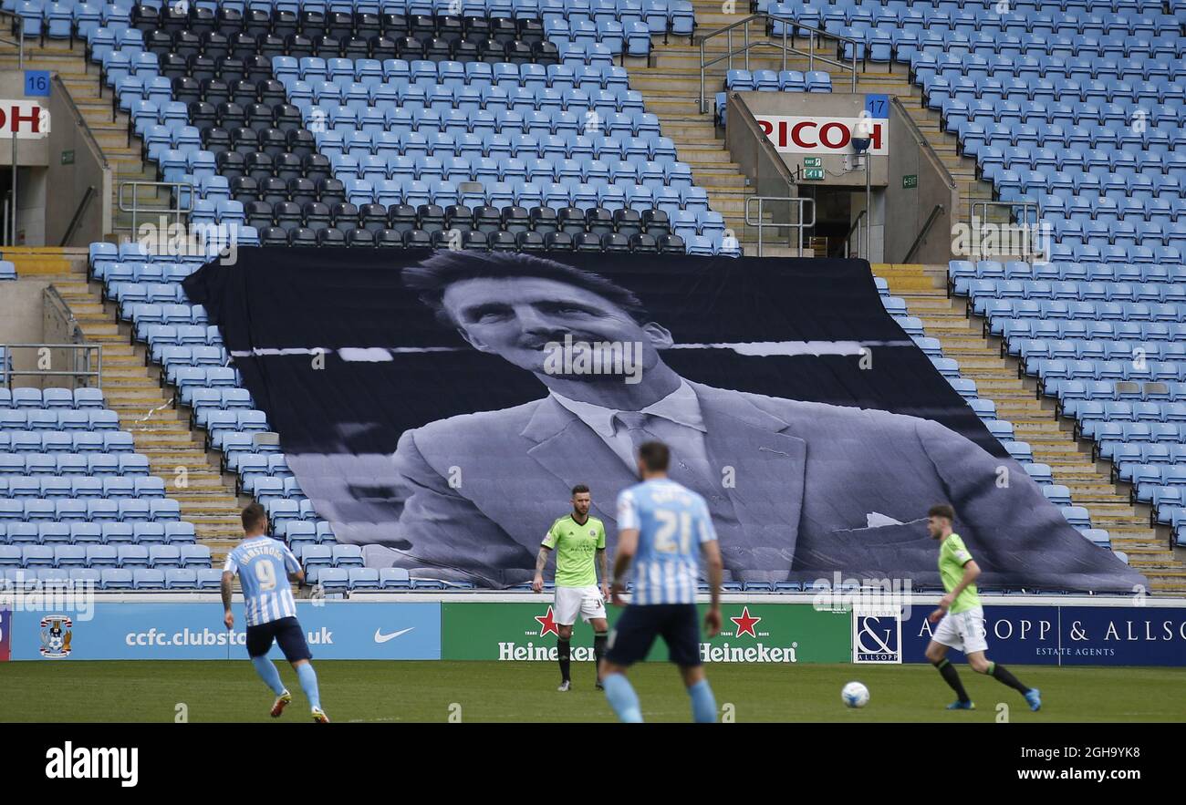On the day the club scattered his ashes a giant poster of Jimmy Hill looks on as the game is played, during the Sky Bet League One match at the Rioch Arena. Photo credit should read: Simon Bellis/Sportimage via PA Images Stock Photo