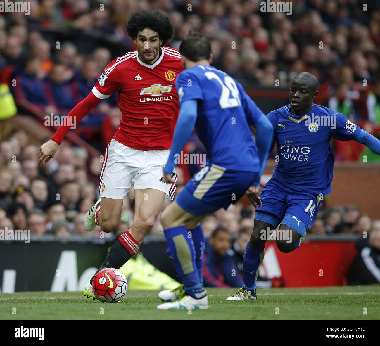 Mauroane Fellaini of Manchester United runs at Christian Fuchs of Leicester City during the Barclays Premier League match at the Old Trafford Stadium. Photo credit should read: Simon Bellis/Sportimage via PA Images                                - Newcastle Utd vs Tottenham - St James' Park Stadium - Newcastle Upon Tyne - England - 19th April 2015 - Picture Phil Oldham/Sportimage Stock Photo