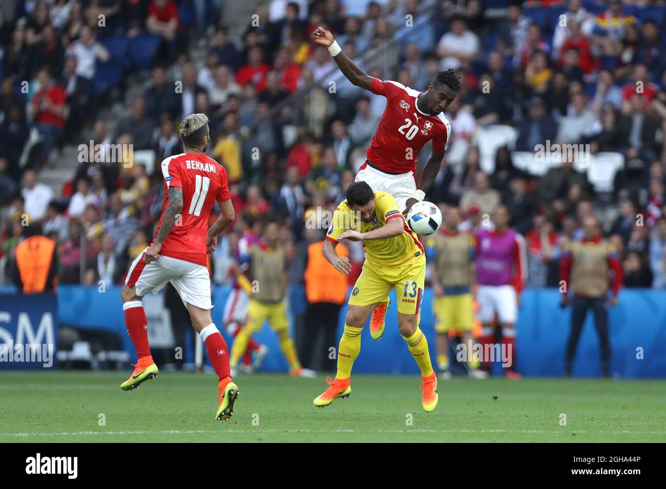 Johan Djourou of Switzerland and Claudiu Keseru of Romania contest a header during the UEFA European Championship 2016 match at the Parc des Princes, Paris. Picture date June 15th, 2016 Pic Phil Oldham/Sportimage via PA Images Stock Photo
