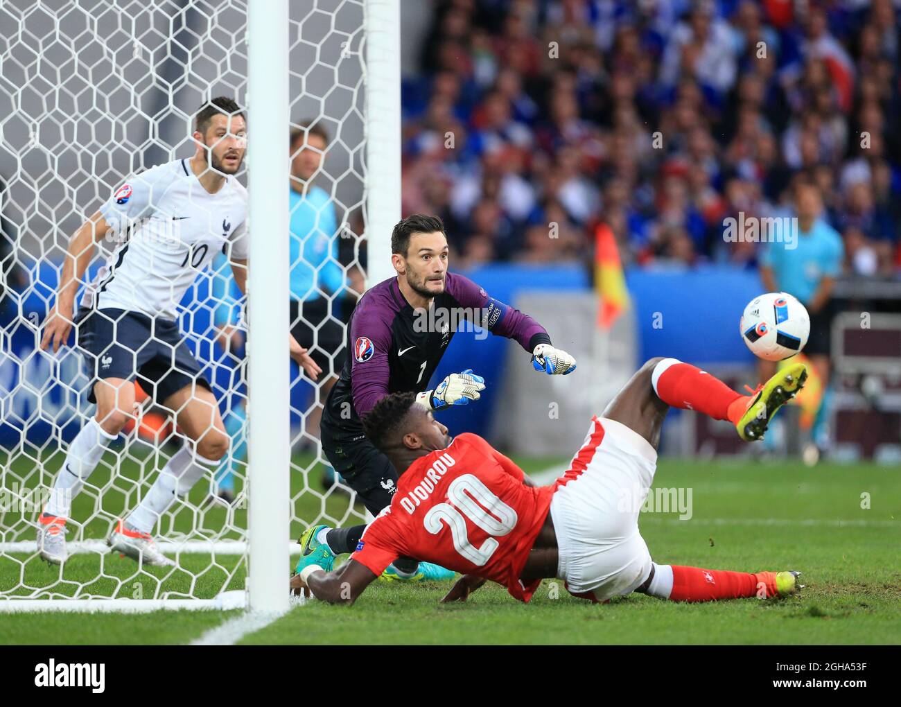 Switzerland's Johan Djourou sees his shot saved by France's Hugo Lloris during the UEFA European Championship 2016 match at the Stade Pierre-Mauroy, Lille. Picture date June 19th, 2016 Pic David Klein/Sportimage via PA Images Stock Photo