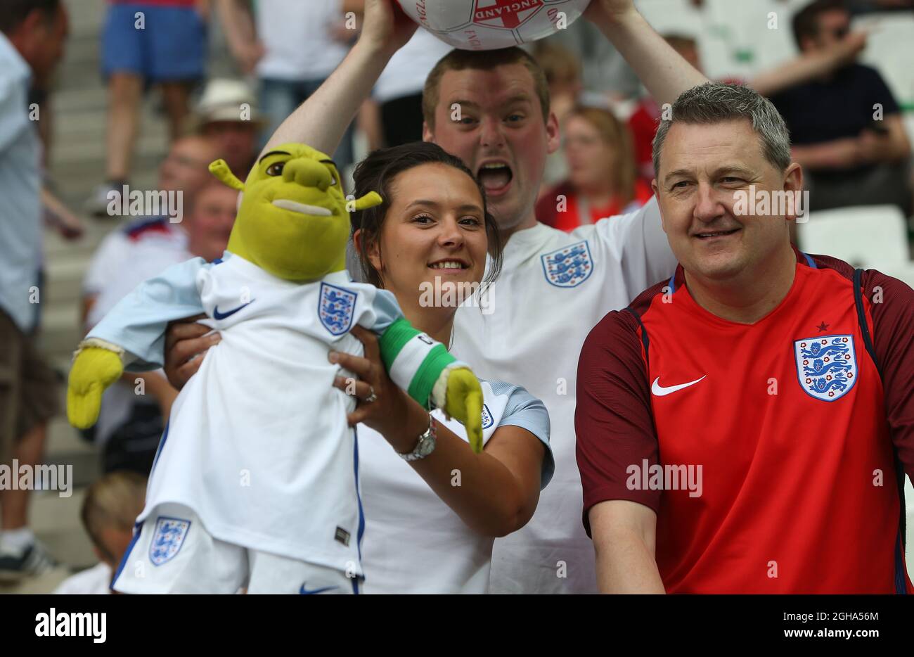 A Wayne Rooney "shrek" mascot held up before the UEFA European Championship 2016 match at the Stade Geoffroy-Guichard, St Etienne. Picture date June 20th, 2016 Pic Phil Oldham/Sportimage via PA Images Stock Photo