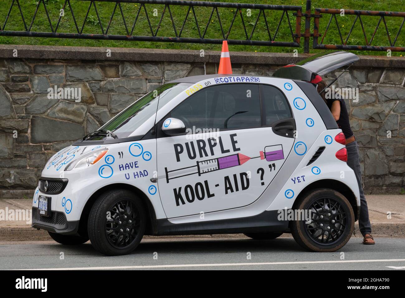 Halifax, Canada. . Anti vaccine car referring to 'have you had Purple Kool-aid' at Freedom rally against proposed Vaccine mandates Stock Photo