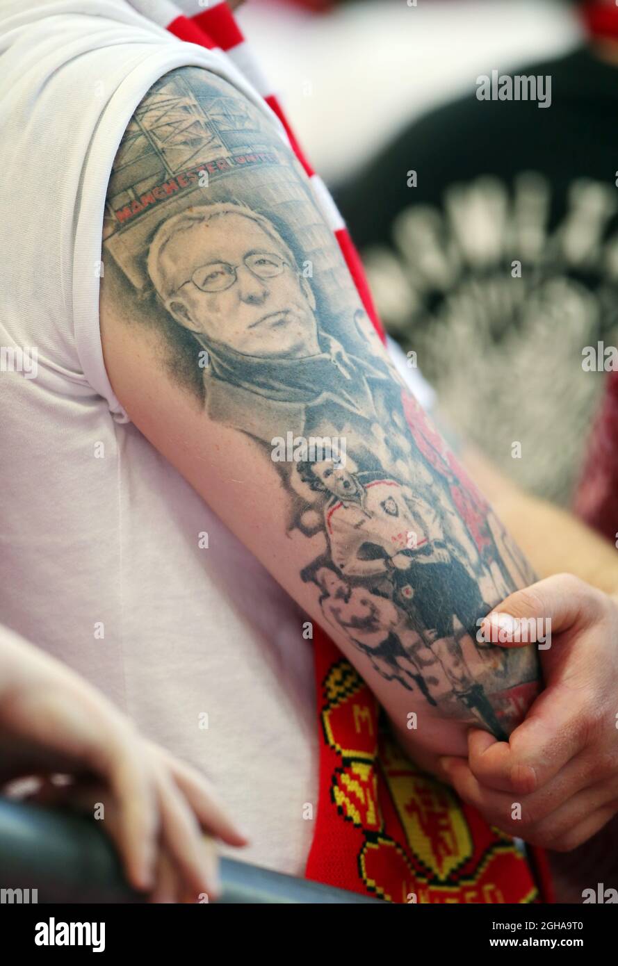 A Manchester United fan shows off his tattoos during the FA Community  Shield match at Wembley Stadium, London. Picture date August 7th, 2016 Pic  David Klein/Sportimage via PA Images Stock Photo -