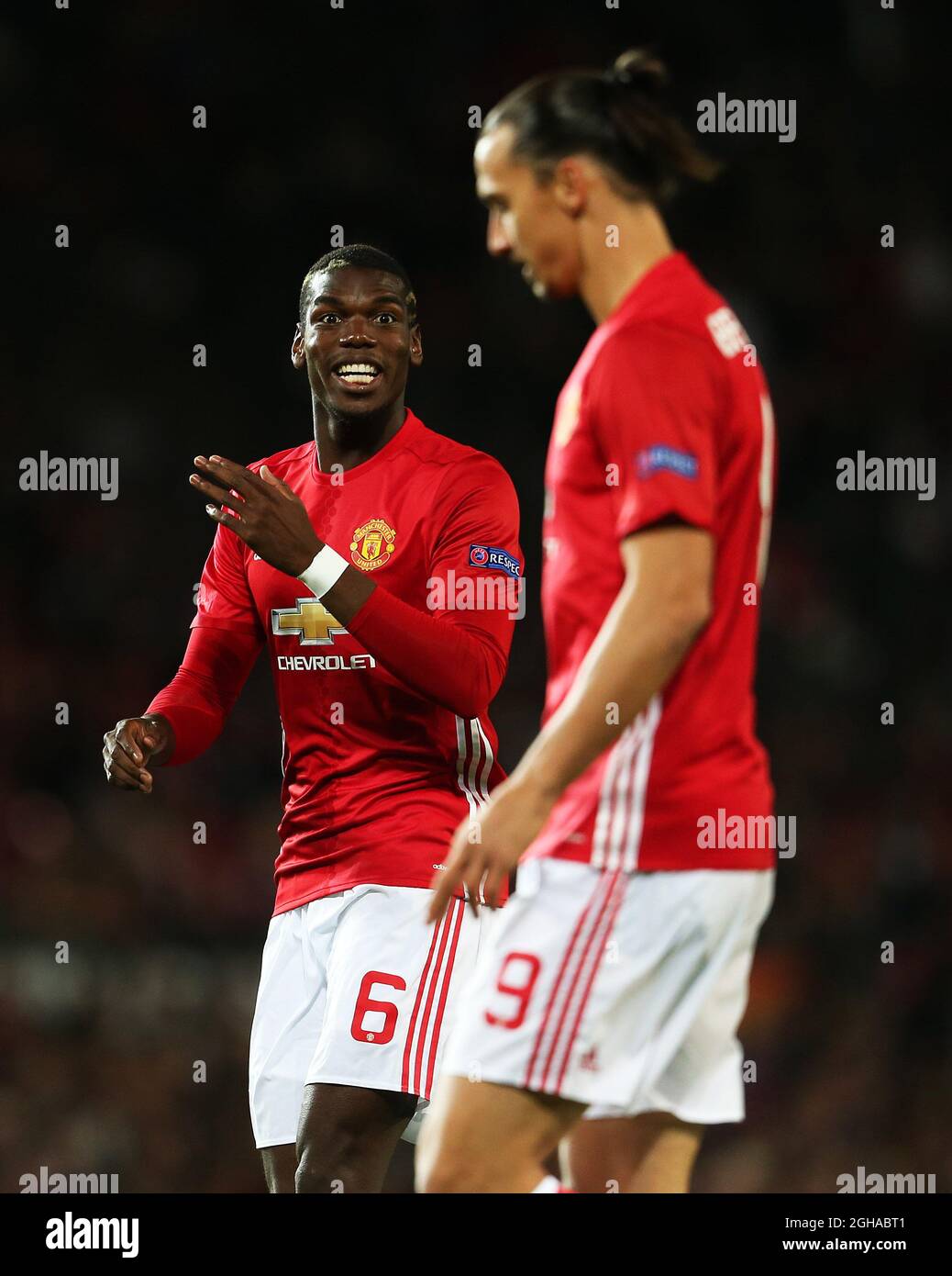 Manchester United fans wearing their Rooney and Ibrahimovic shirts before  the game against Everton Stock Photo - Alamy