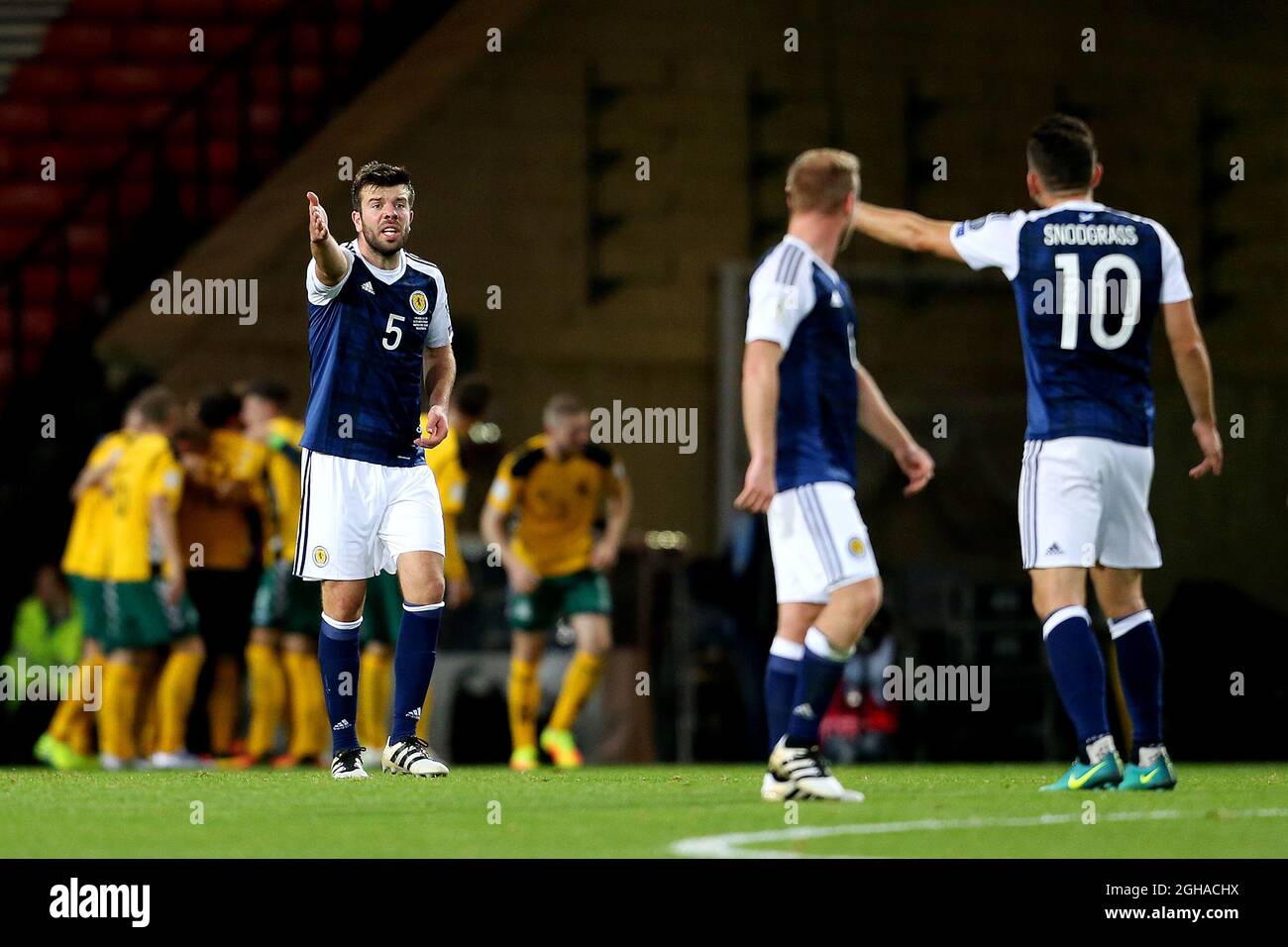 Grant Hanley of Scotland argues with Robert Snodgrass after conceding the opening goal during the 2018 FIFA World Cup Qualfiication Group F match at Hampden Park, Glasgow. Picture date: October 8th, 2016. Pic Matt McNulty/Sportimage via PA Images Stock Photo