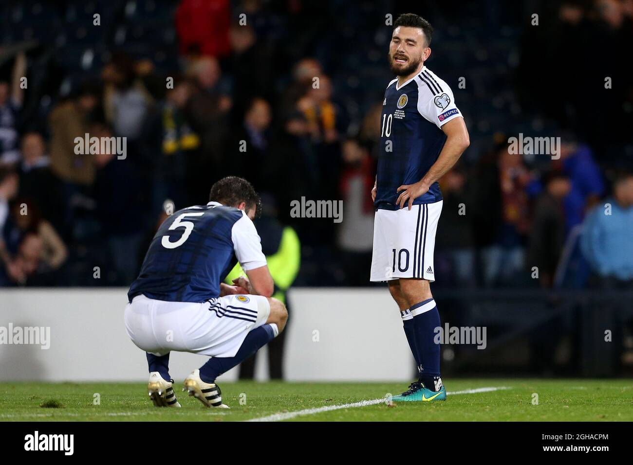 Robert Snodgrass of Scotland and Grant Hanley look dejected at full time during the 2018 FIFA World Cup Qualfiication Group F match at Hampden Park, Glasgow. Picture date: October 8th, 2016. Pic Matt McNulty/Sportimage via PA Images Stock Photo