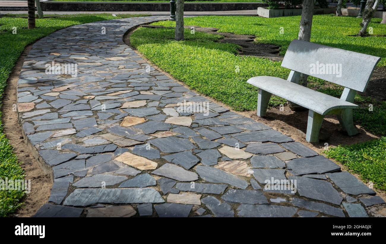 Stone pavement walkway in the park . Landscaping in the city park Stock Photo