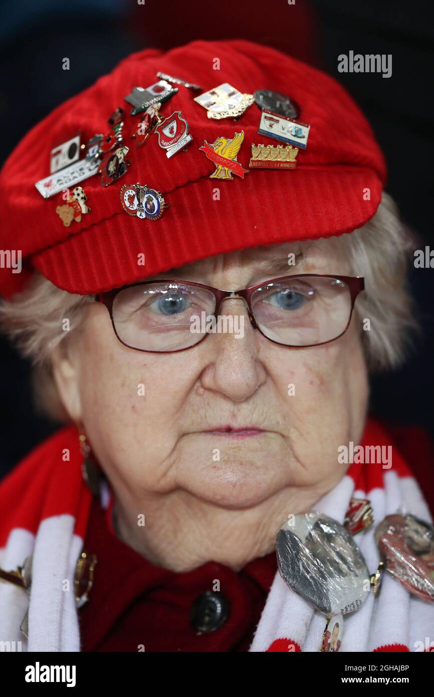 Liverpool fan before the English Premier League match at Anfield ...
