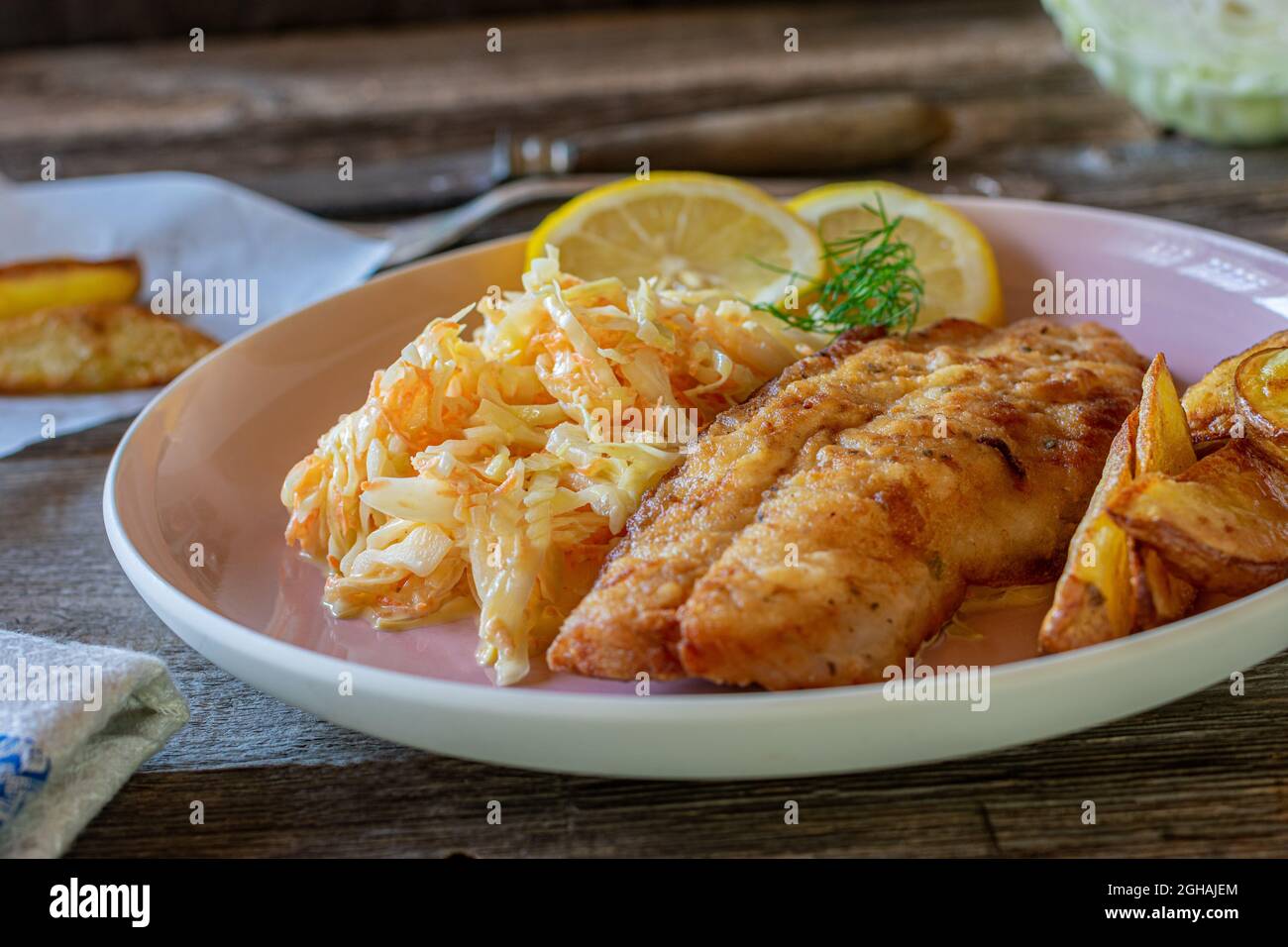 Breaded fish with homemade coleslaw hi-res stock photography and images ...