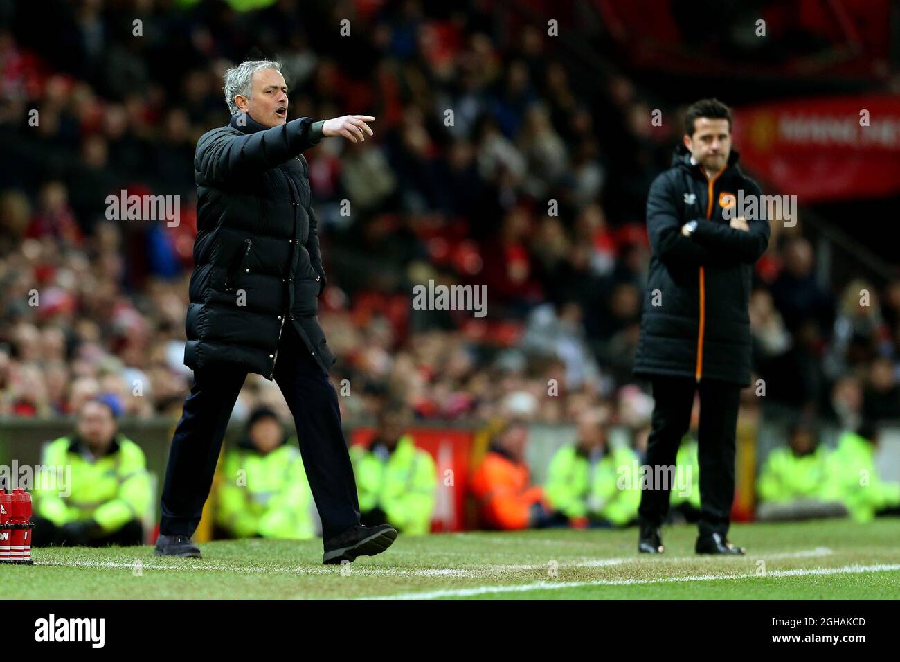 Manchester United manager Jose Mourinho shouts instructions ahead of Hull City manager Marco Silvaduring the EFL Cup semi final 1st Leg match at Old Trafford Stadium, Manchester. Picture date: January 10th, 2017. Pic credit should read: Matt McNulty/Sportimage via PA Images Stock Photo