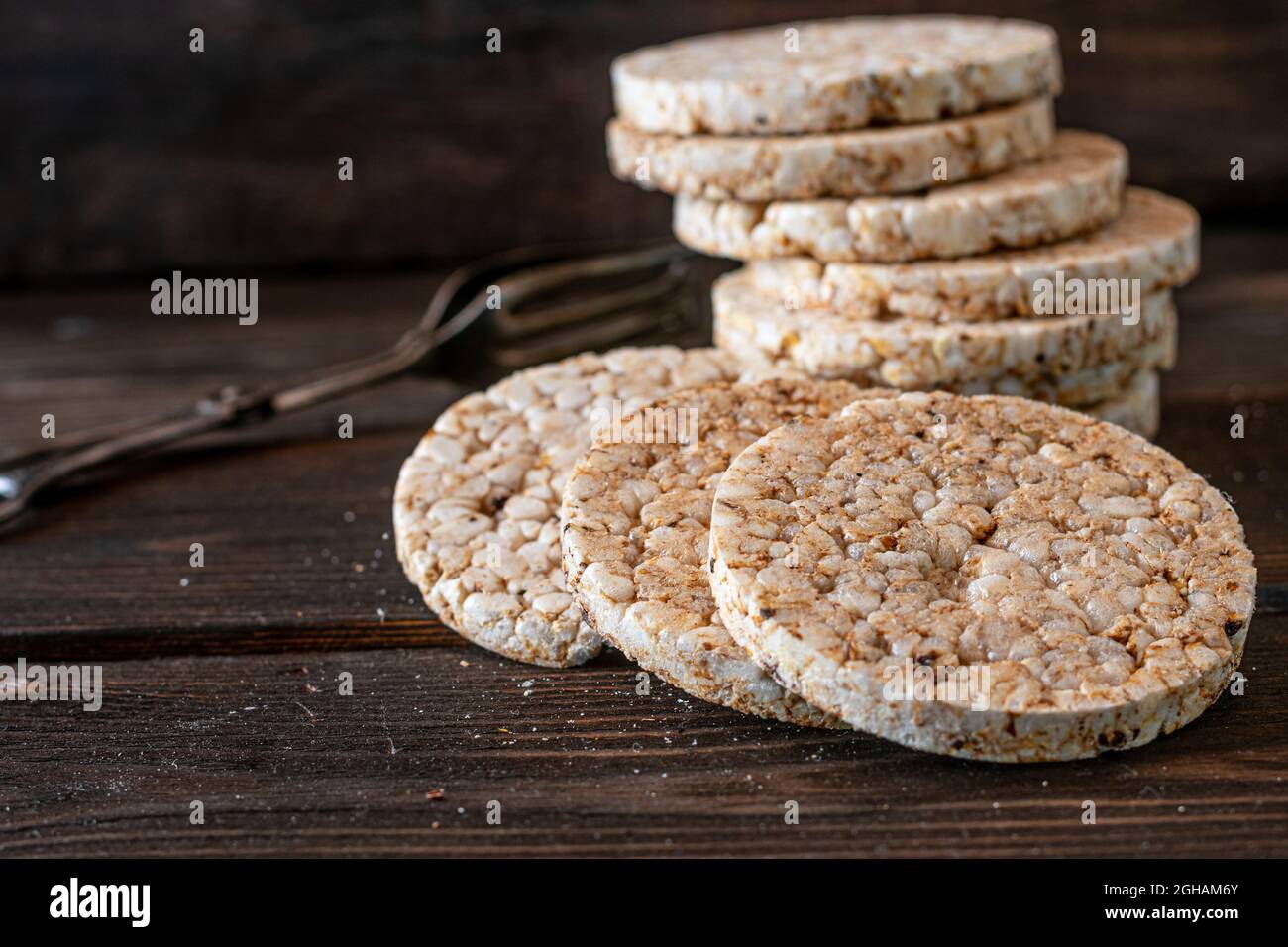 puffed rice cakes on wooden background Stock Photo