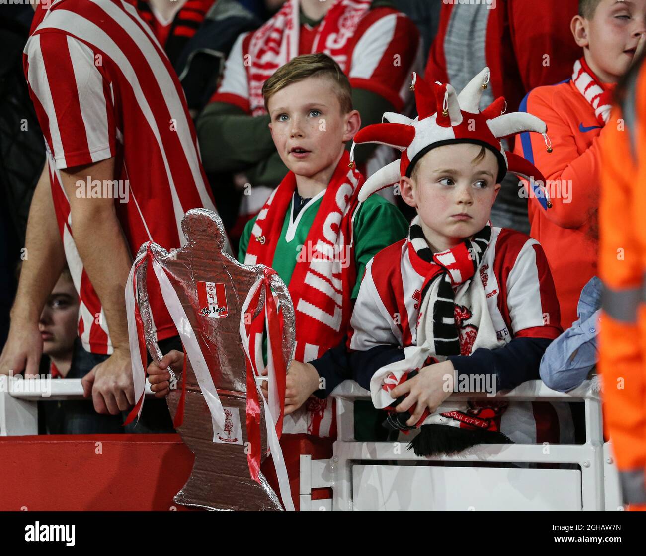Young Lincoln fans look on dejected during the FA Cup Quarter Final match at the Emirates Stadium, London. Picture date March 11th, 2017 Pic David Klein/Sportimage via PA Images Stock Photo