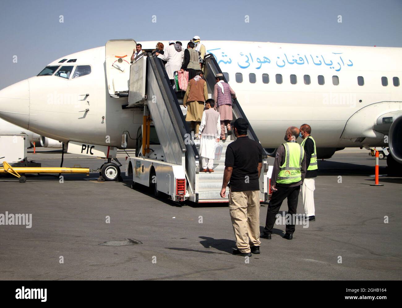 Kabul, Afghanistan. 6th Sep, 2021. Passengers board a plane at the airport in Kabul, capital of Afghanistan, Sept. 6, 2021. Afghanistan's flag carrier airline Ariana Afghan Airlines has resumed domestic flights, a local television channel reported Sunday. Credit: Saifurahman Safi/Xinhua/Alamy Live News Stock Photo