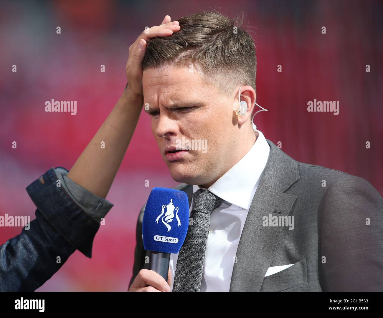 BT Sport link man Jake Humphries getting his hair done in between takes during the Emirates FA Cup Final match at Wembley Stadium, London. Picture date: May 27th, 2017.Picture credit should read: David Klein/Sportimage via PA Images Stock Photo