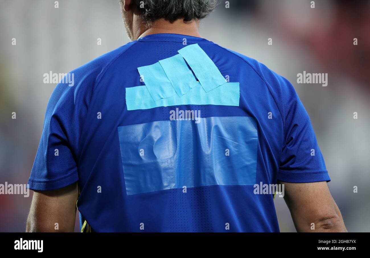 A Spanish coach is made to cover over his Adidas logo during the UEFA Under  21 Final at the Stadion Cracovia in Krakow. Picture date 30th June 2017.  Picture credit should read: