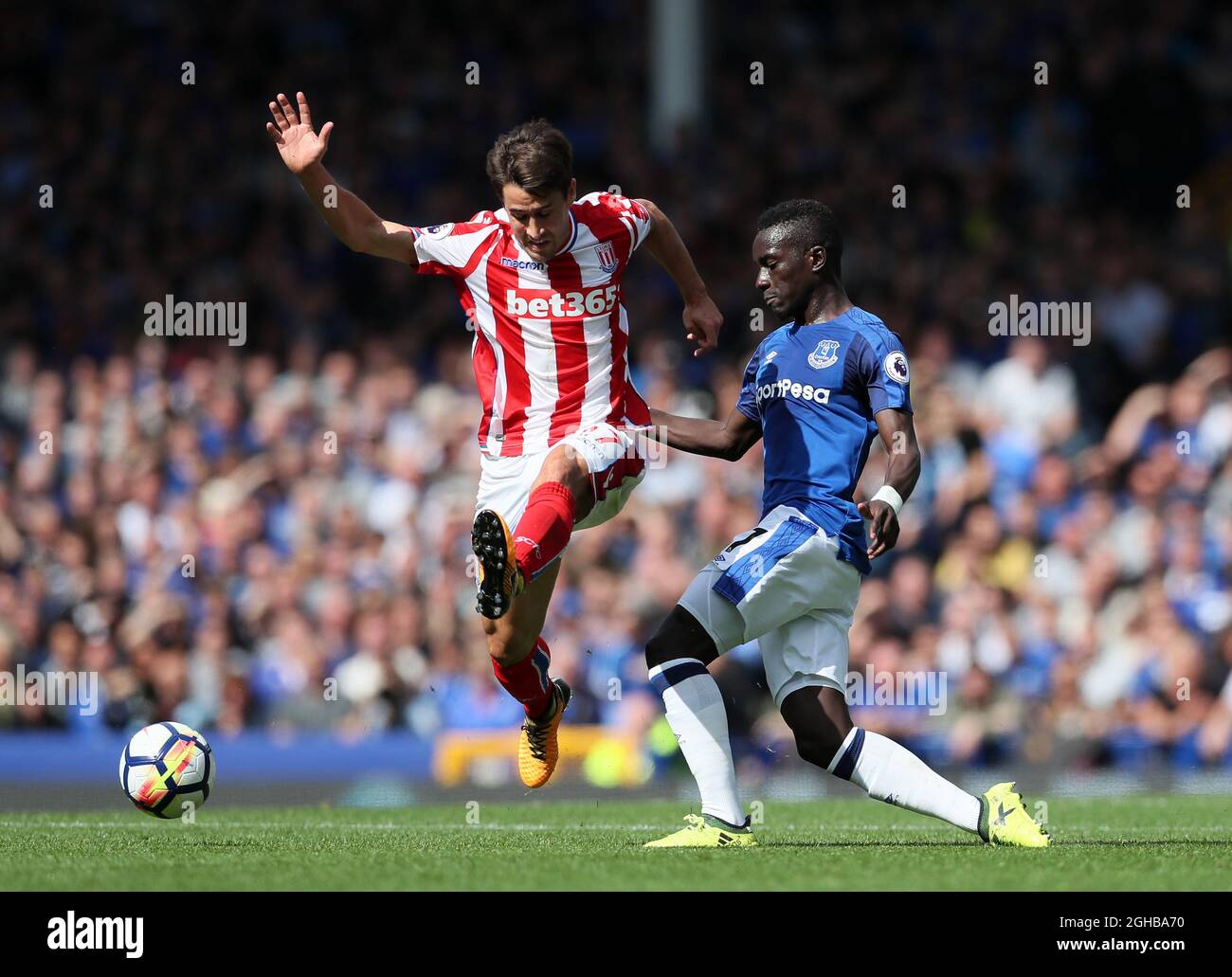 Everton's Idrissa Gana Gueye tussles with Stoke's Bojan during the premier league match at Goodison Park, Liverpool. Picture date 12th August 2017. Picture credit should read: David Klein/Sportimage via PA Images Stock Photo