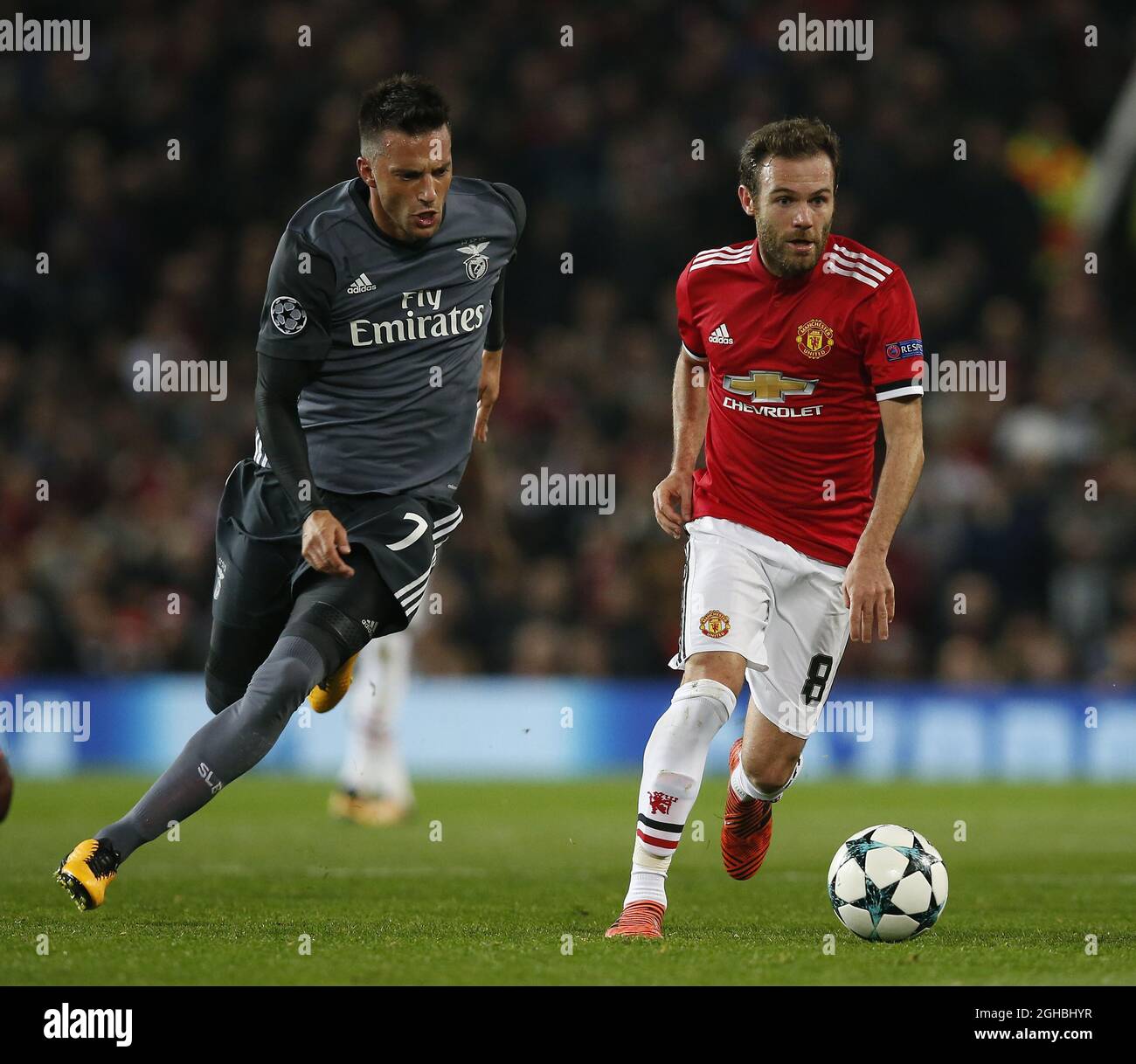 Andreas Samaris of SL Benfica shadows Juan Mata of Manchester United during the Champions League Group A match at the Old Trafford Stadium, Manchester. Picture date: October 31st 2017. Picture credit should read: Andrew Yates/Sportimage via PA Images Stock Photo