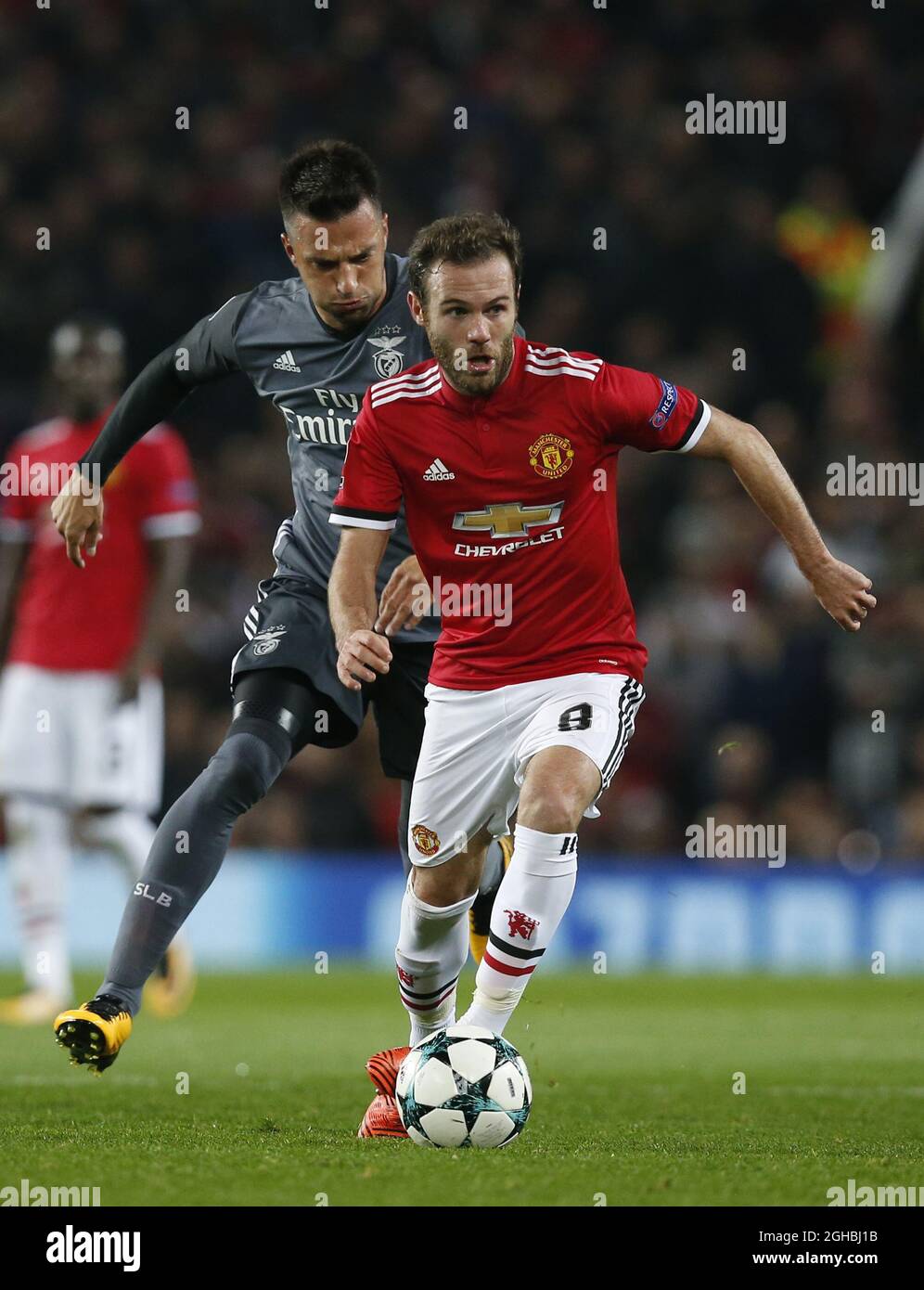 Andreas Samaris of SL Benfica shadows Juan Mata of Manchester United during the Champions League Group A match at the Old Trafford Stadium, Manchester. Picture date: October 31st 2017. Picture credit should read: Andrew Yates/Sportimage via PA Images Stock Photo