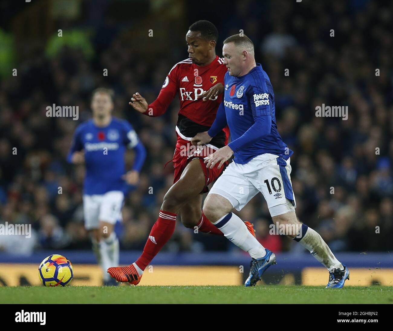 Andre Carrillo of Watford tackled by Wayne Rooney of Everton during the premier league match at Goodison Park  Stadium, Liverpool. Picture date: 5th November 2017. Picture credit should read: Andrew Yates/Sportimage via PA Images Stock Photo